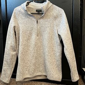 Small tan quarter zip storm pack sweatshirt
